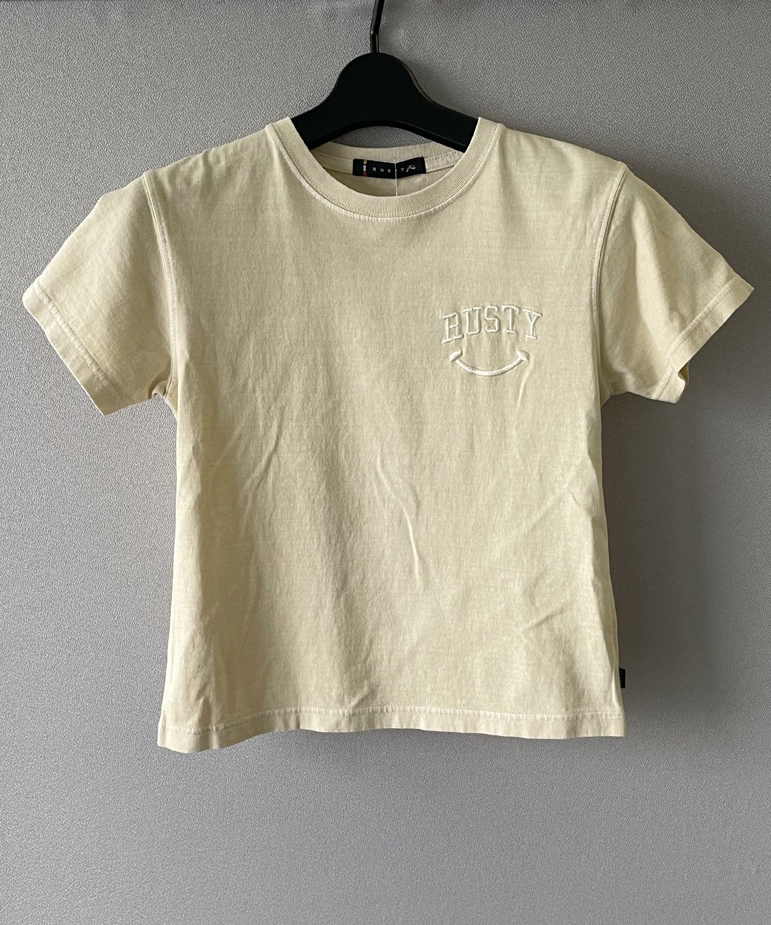 RUSTY ラスティー キッズ Tシャツ 半袖 バックロゴ ニコちゃんマーク シンプル 964500(BEG-130cm)