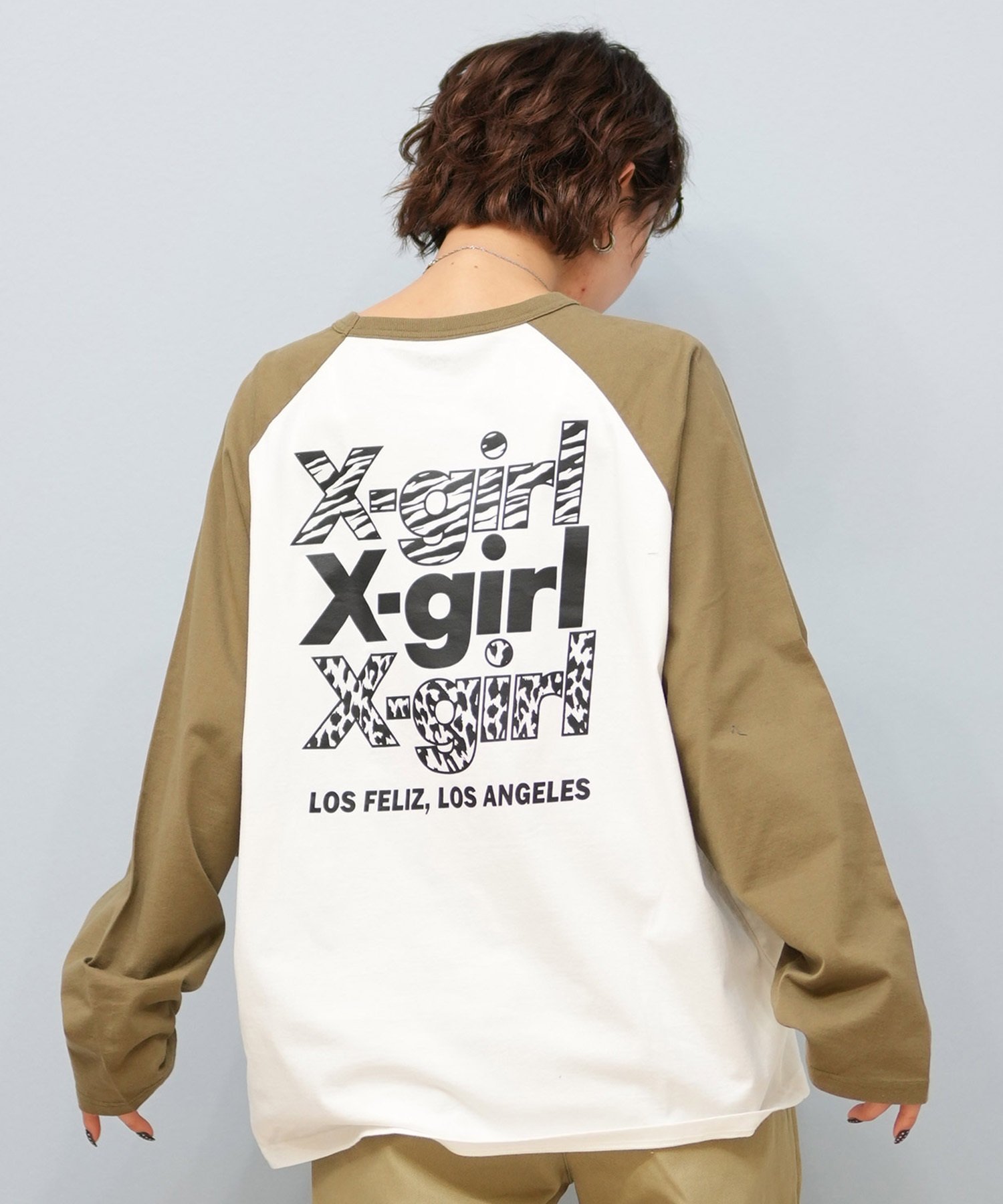 X-girl エックスガール 長袖 Tシャツ レディース ロンT ラグラン バックプリント オーバーサイズ ANML TRPL LG BB BIG TEE 105251011026(BLACK-S)